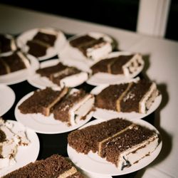 Its Sugarlicious - A cross-section of our signature sheet cake. Featuring moist layers and our light and less-sweet buttercream for a perfect bite.