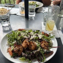 Harvest salad and evoke and tonic cocktail Harvest salad and evoke and tonic cocktail