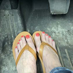 Onyx Studio - Most enjoyable pedicure!! Great spring color! (Please excuse my dirty floorboard!)