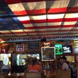 Dallys Down Under Saloon - I believe it's a Garrison flag hanging over the bar inside. Very cool.
