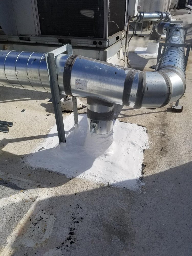 Slide of Huncho Roofer