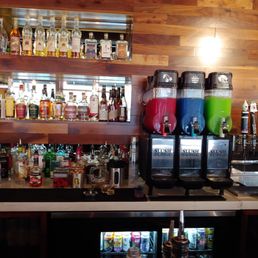 Full bar with a slushie machine