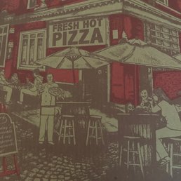 a pizza box on a table a pizza box on a table