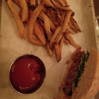 Aliment - Half of the burger and fries - New American Near Me - San Francisco, California