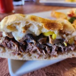 Food & Friends - The boardroom steak with mushrooms, banana peppers and cheese.