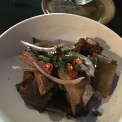 OSO Sonoma - Succulent pork ribs in tasty sauce with red onions and spicy peppers