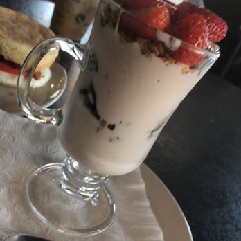 Joe Black Coffee Bar - a glass of milkshake with strawberries on top - Coffee & Tea Near Me - Winnipeg, Manitoba Joe Black Coffee Bar - a glass of milkshake with strawberries on top - Coffee & Tea Near Me - Winnipeg, Manitoba