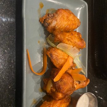 The Rooftop at the Overland - a platter of chicken wings and carrots - Tapas/Small Plates Near Me - Atlanta, Georgia The Rooftop at the Overland - a platter of chicken wings and carrots - Tapas/Small Plates Near Me - Atlanta, Georgia