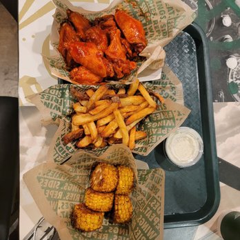 Wingstop - a tray of chicken wings, corn, and fries - Chicken Wings Near Me - Queen Creek, Arizona Wingstop - a tray of chicken wings, corn, and fries - Chicken Wings Near Me - Queen Creek, Arizona