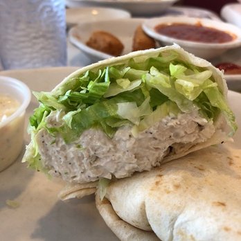 Round The Clock Diner - Chicken salad wrap (and mozzarella sticks in the background) - Diners Near Me - York, Pennsylvania Round The Clock Diner - Chicken salad wrap (and mozzarella sticks in the background) - Diners Near Me - York, Pennsylvania