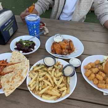 Chicken N Pickle - San Antonio - Beets, truffle fries, smoked wings, Kids Cheese Quesadilla with added chicken - Pickleball Near Me - San Antonio, Texas
