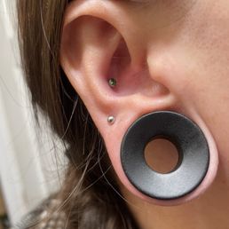 Conch piercing by Nazba. Conch piercing by Nazba.