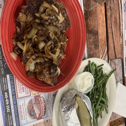 Madison Family Restaurant - Ribeye steak with mushrooms and onions, baked potato and green beans