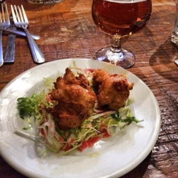 Kings Row Gastropub - Sweet corn and goat cheese fritters on baby greens with fresh cranberry maple dressing?! Don't mind if I do! - Gastropubs Near Me - Pasadena, California