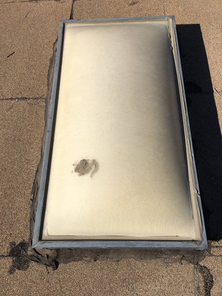 Slide of jauregui's roofing