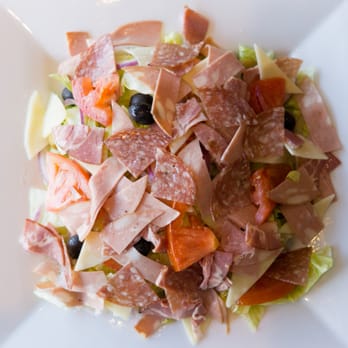 Dante's Pizzeria - Paoletti's Italian Salad. On Ice berg Lettuce, Tomato, Red Onions, Olives, Mozzarella Cheese, Salami, Capicollo & Mortadella - Pizza Near Me - Concord, Ontario Dante's Pizzeria - Paoletti's Italian Salad. On Ice berg Lettuce, Tomato, Red Onions, Olives, Mozzarella Cheese, Salami, Capicollo & Mortadella - Pizza Near Me - Concord, Ontario