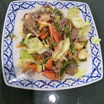 Thai Basil - Thai Spicy Salad - Yum-Nuah( Sliced-Grilled-Sirloin) - Thai Near Me - Roseville, California Thai Basil - Thai Spicy Salad - Yum-Nuah( Sliced-Grilled-Sirloin) - Thai Near Me - Roseville, California