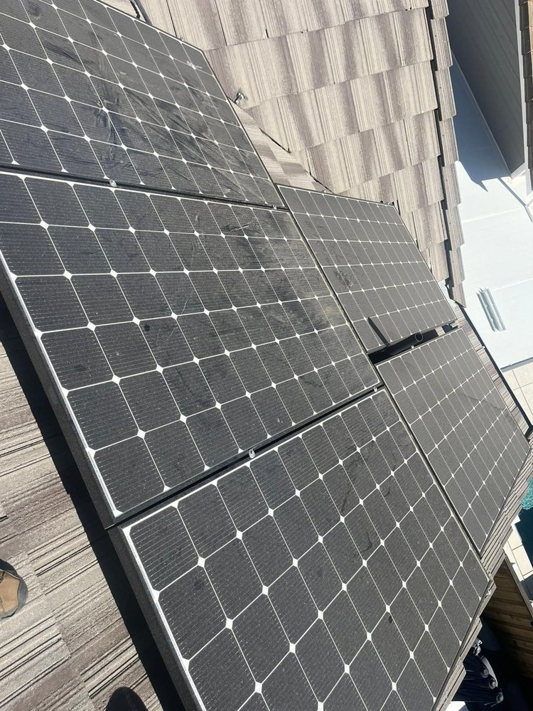 Slide of Tommy´s Roofing