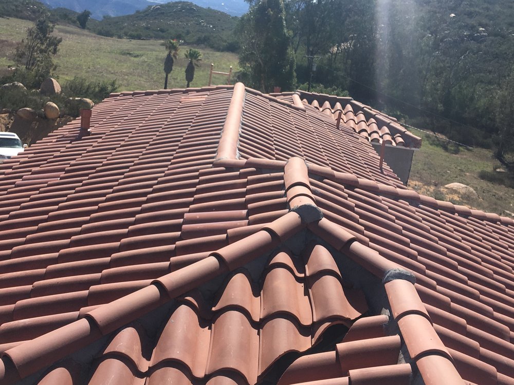 Slide of Millennium Roofing