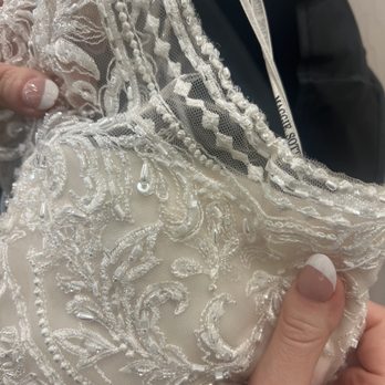 Ten Bridal - The beads were just pulled together to "fit" it changed the integrity of the dress - Bridal Near Me - Henderson, Nevada Ten Bridal - The beads were just pulled together to "fit" it changed the integrity of the dress - Bridal Near Me - Henderson, Nevada