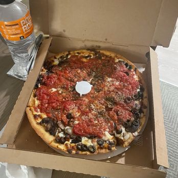 Little Angelo's Pizza - Bottle for size reference. - Pizza Near Me - Des Plaines, Illinois Little Angelo's Pizza - Bottle for size reference. - Pizza Near Me - Des Plaines, Illinois
