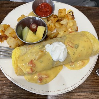 First Watch - Chickichanga with fresher fruit and seasoned potatoes. The potatoes were a little undercooked. - Breakfast & Brunch Near Me - Arlington, Texas First Watch - Chickichanga with fresher fruit and seasoned potatoes. The potatoes were a little undercooked. - Breakfast & Brunch Near Me - Arlington, Texas