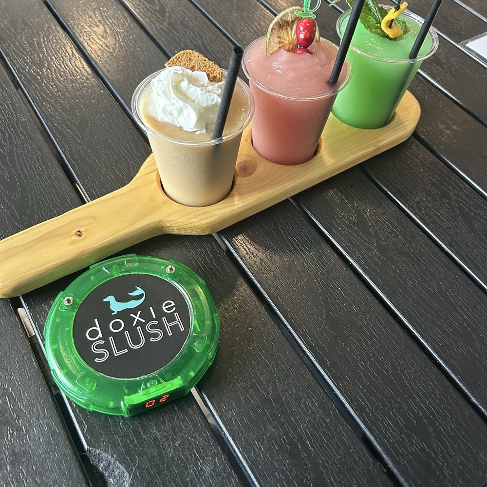 Doxie Slush - Cookies and Milk, Pomegranate Margarita, and Christmas on the beach - Seafood Near Me - Hermann, Missouri Doxie Slush - Cookies and Milk, Pomegranate Margarita, and Christmas on the beach - Seafood Near Me - Hermann, Missouri