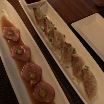 O-Ku - Yellowtail Carpaccio (left) Dumplings (right) - Sushi Bars Near Me - Raleigh, North Carolina O-Ku - Yellowtail Carpaccio (left) Dumplings (right) - Sushi Bars Near Me - Raleigh, North Carolina