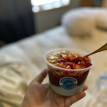 Nautical Bowls - a hand holding a bowl of fruit - Acai Bowls Near Me - Maple Grove, Minnesota