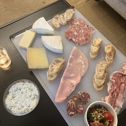 Mortadella, prosciutto, pasta salad, garlic and herb spread, ciabatta, Camembert, white cheddar Mortadella, prosciutto, pasta salad, garlic and herb spread, ciabatta, Camembert, white cheddar