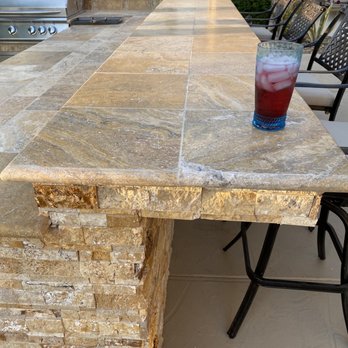 Paseo Hardscapes - a table with a drink on it - Landscaping Near Me - Peoria, Arizona