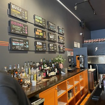 Sweet Avenue - a man standing at the bar - Beer Bar Near Me - Sunnyside, New York Sweet Avenue - a man standing at the bar - Beer Bar Near Me - Sunnyside, New York