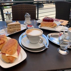 Bochtler , Bäckerei-Café - Salami and cheese sandwiches, mousse cake and raspberry tart and cappuccino.