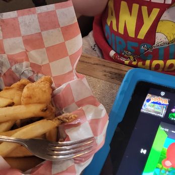 Boston's Fish House - Grandson's Cod & Fries w/ his iPad - Seafood Near Me - Winter Park, Florida Boston's Fish House - Grandson's Cod & Fries w/ his iPad - Seafood Near Me - Winter Park, Florida