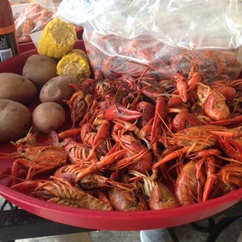 La Boilers - A pound of crawfish, with another pound still in a bag, potatoes and corn - Seafood Near Me - Baton Rouge, Louisiana La Boilers - A pound of crawfish, with another pound still in a bag, potatoes and corn - Seafood Near Me - Baton Rouge, Louisiana