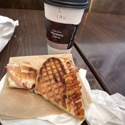 Lavender latte and ham and Swiss panini. First time trying this spot! I'm highly recommend it!