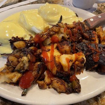 Cappys Cafe - Eggs Benedict with seasoned potatoes - Breakfast & Brunch Near Me - Newport Beach, California Cappys Cafe - Eggs Benedict with seasoned potatoes - Breakfast & Brunch Near Me - Newport Beach, California