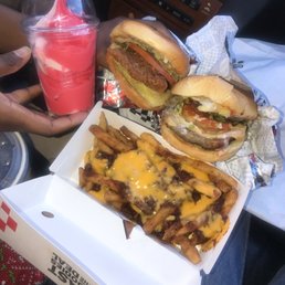 a box of cheeseburgers and fries