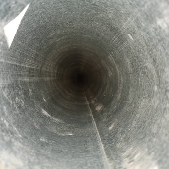 Vent Cleaning Hero - This after pic is dramatically different from the image showing how clogged it was. - Air Duct Cleaning Near Me