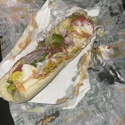 a sub sandwich on a piece of paper