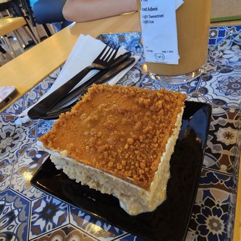 Qamaria Yemeni Coffee - Iced Adeni and biscoff milk cake. - Coffee & Tea Near Me - Pleasanton, California Qamaria Yemeni Coffee - Iced Adeni and biscoff milk cake. - Coffee & Tea Near Me - Pleasanton, California