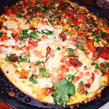 Moose's Tooth - Half chicken Rockefeller and half Santa's helper. Phenomenal! - Pizza Near Me - Anchorage, Alaska