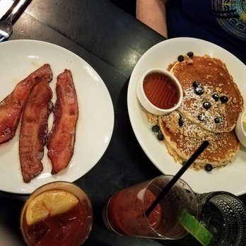 The Metropolitan Downtown - Blueberry Granola Pancakes with side of bacon. - Venues & Event Spaces Near Me - Cheyenne, Wyoming The Metropolitan Downtown - Blueberry Granola Pancakes with side of bacon. - Venues & Event Spaces Near Me - Cheyenne, Wyoming