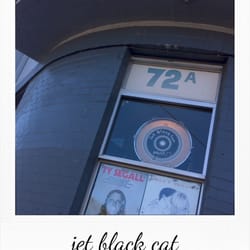 Jet Black Cat Music - Side window