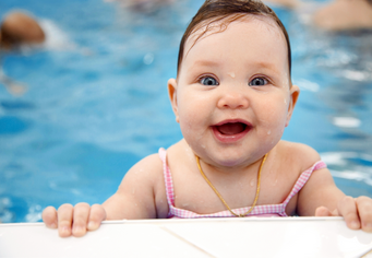 Mommy/Daddy & Me - Swim Lessons For Infants - We use lots of games, songs and play (floating & water squirting toys) to engage your child in a way that makes getting used to the water a fun experience. The main benefit to starting out at such a young age is to prevent a fear of water from ever developing, so that swimming will become a safe and pleasant activity for your child. We strive to get your baby water-safe as soon as possible, and to have a healthy love and respect for the water. Mommy/Daddy & Me - Swim Lessons For Infants - We use lots of games, songs and play (floating & water squirting toys) to engage your child in a way that makes getting used to the water a fun experience. The main benefit to starting out at such a young age is to prevent a fear of water from ever developing, so that swimming will become a safe and pleasant activity for your child. We strive to get your baby water-safe as soon as possible, and to have a healthy love and respect for the water.