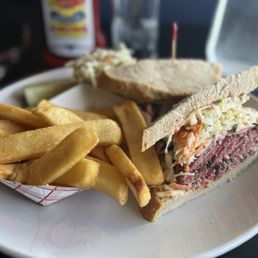 #32 Pastrimi with steak fries, cole slaw and deli pickle.