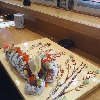 Ken Sushi - The Ken House special roll. Yes, it has edible gold flakes on it. Salmon, tuna, egg, shrimp tempura, and cucumber inside. - Sushi Bars Near Me - Waterloo, Ontario