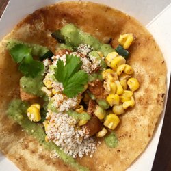 The Guac Box - The Nick- marinated chicken, poblanos, grilled onions, cilantro, street corn and guac sauce.