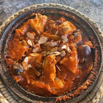 Tara Kitchen - a bowl of stew with almonds on top - Moroccan Near Me - Albany, New York Tara Kitchen - a bowl of stew with almonds on top - Moroccan Near Me - Albany, New York