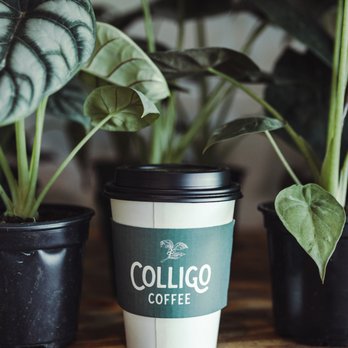 Colligo Coffee - a cup of coffee on a table - Coffee & Tea Near Me - Sumter, South Carolina Colligo Coffee - a cup of coffee on a table - Coffee & Tea Near Me - Sumter, South Carolina